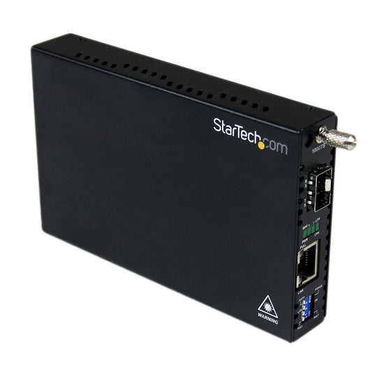 StarTech CONVERT AND EXTEND A GIGABIT ETHERNET CONNECTION OVER FIBER USING THE GIGABIT SF